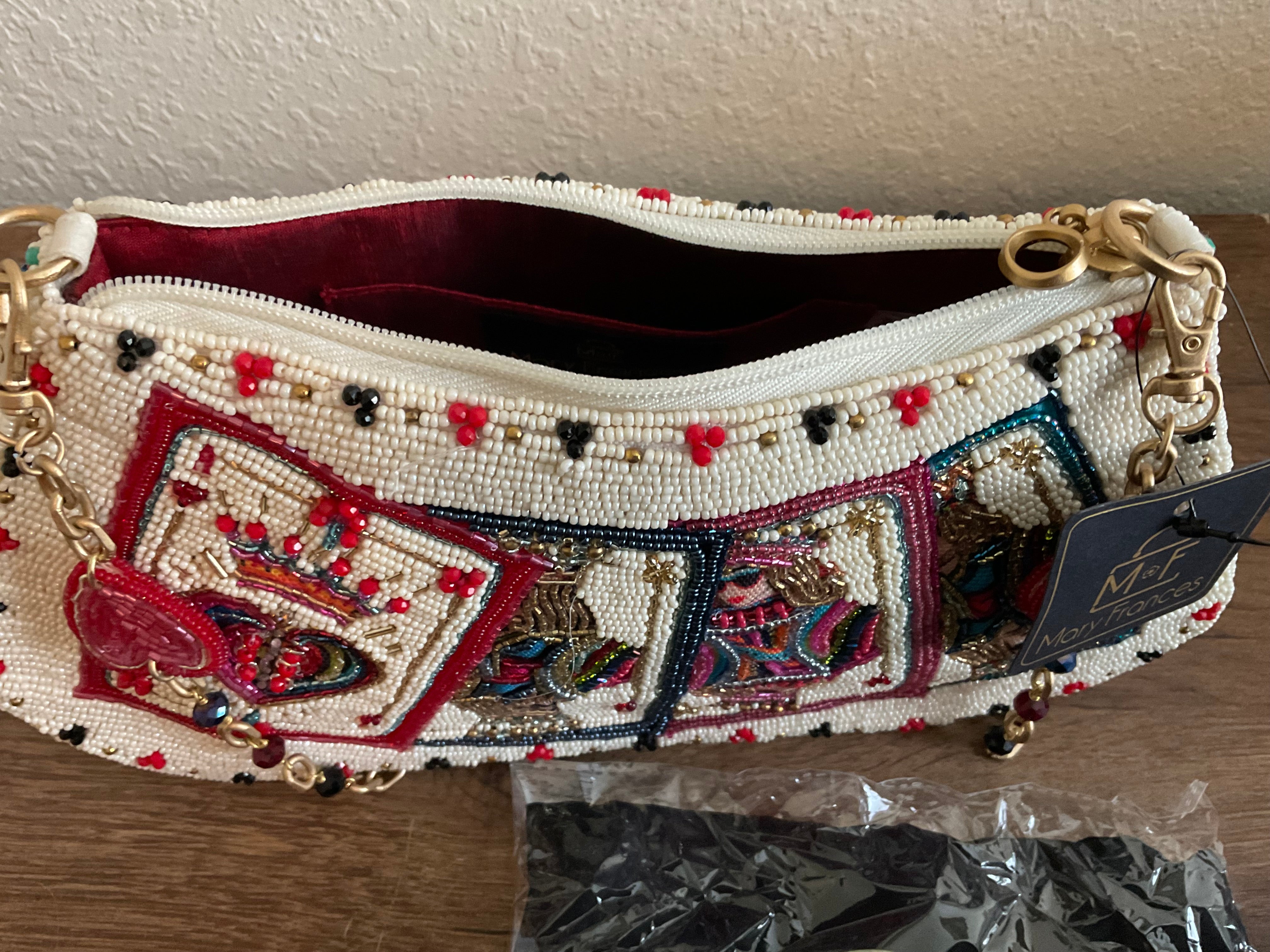 Mary Frances “Shuffle Crossbody” – The Silkie Peacock